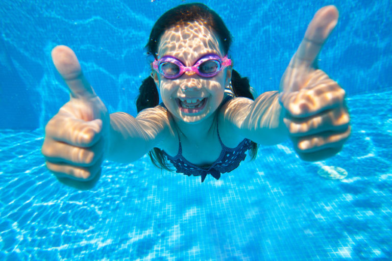 girl underwater enjoying the benefits of swimming